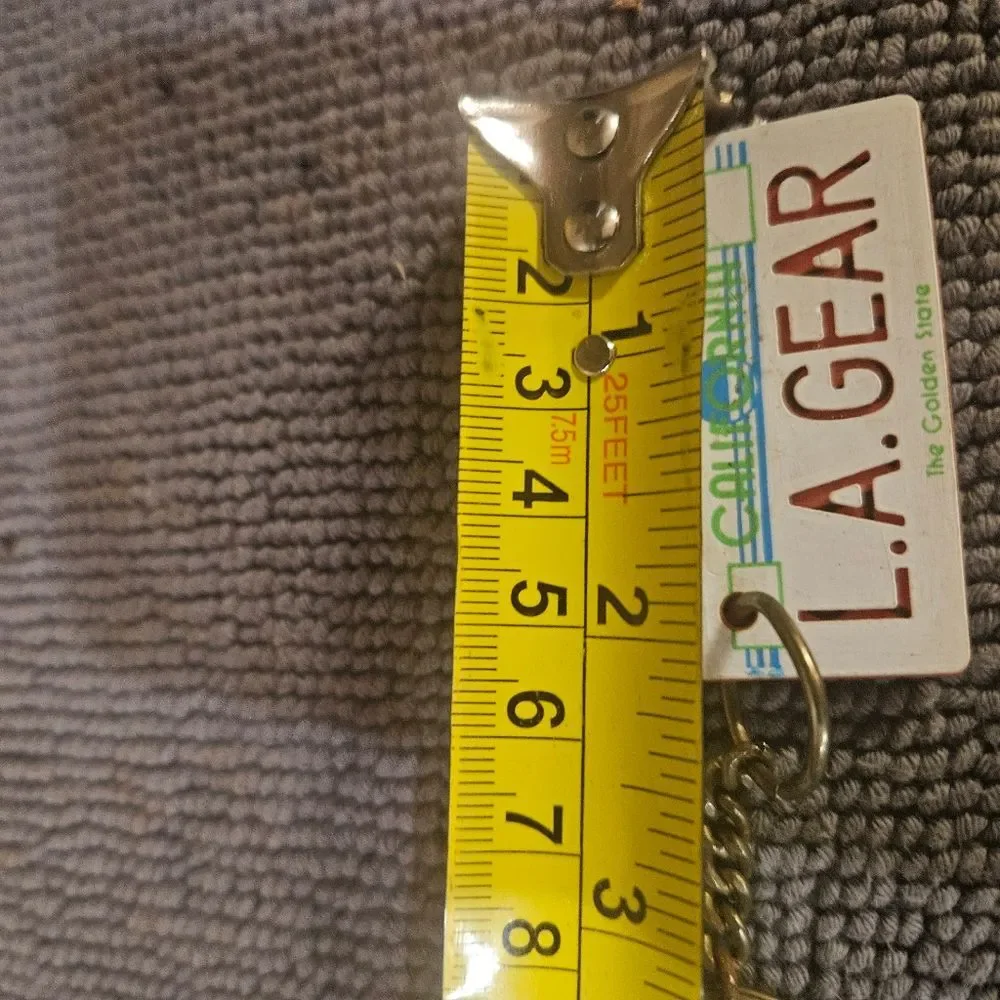 1980's L.A. Gear California license plate keychain tag